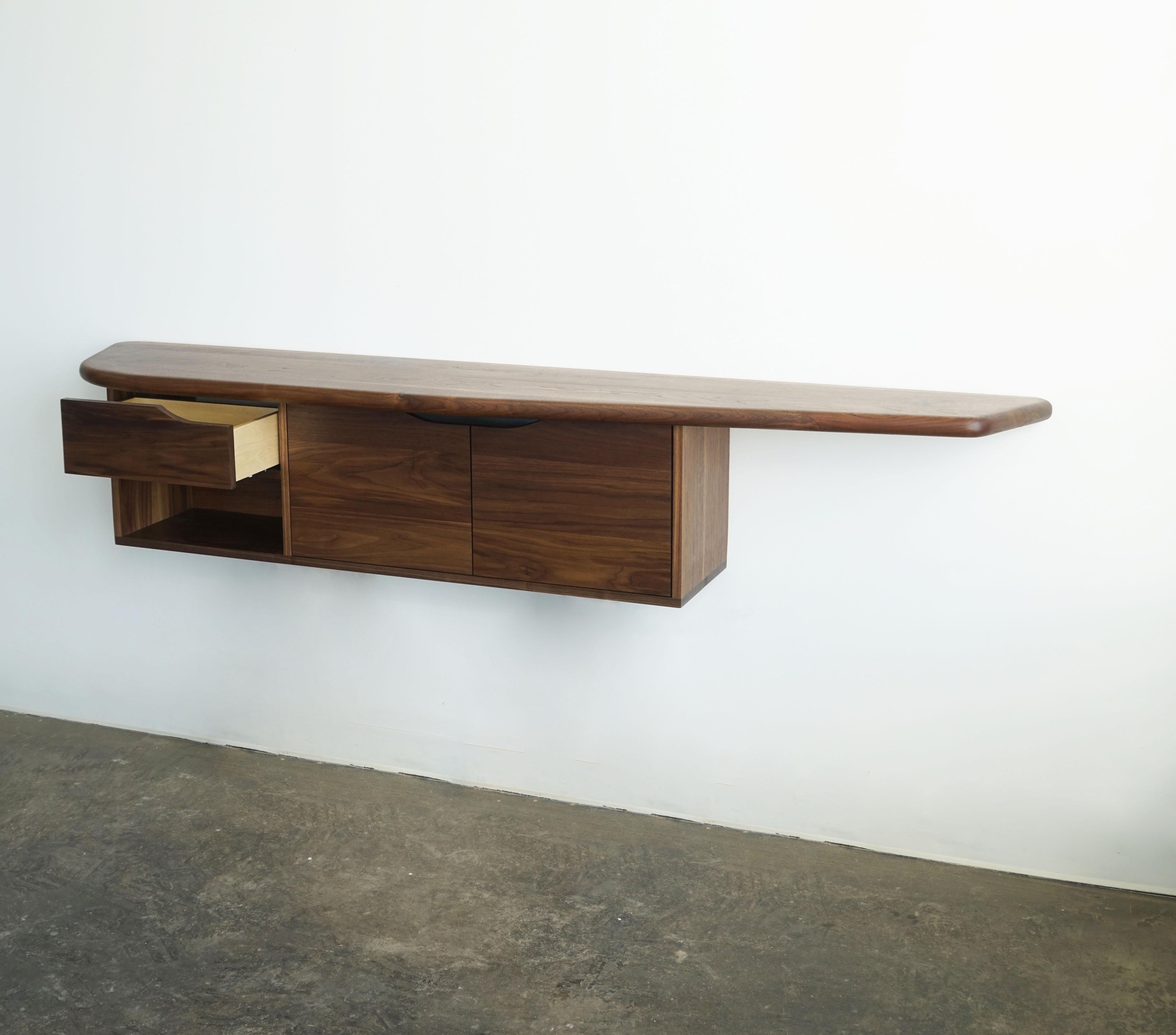 https://a.1stdibscdn.com/organic-shaped-modern-hanging-wall-unit-cabinet-by-last-workshop-walnut-for-sale-picture-5/f_73622/f_376999521703530957655/wall_unit_9_master.jpg