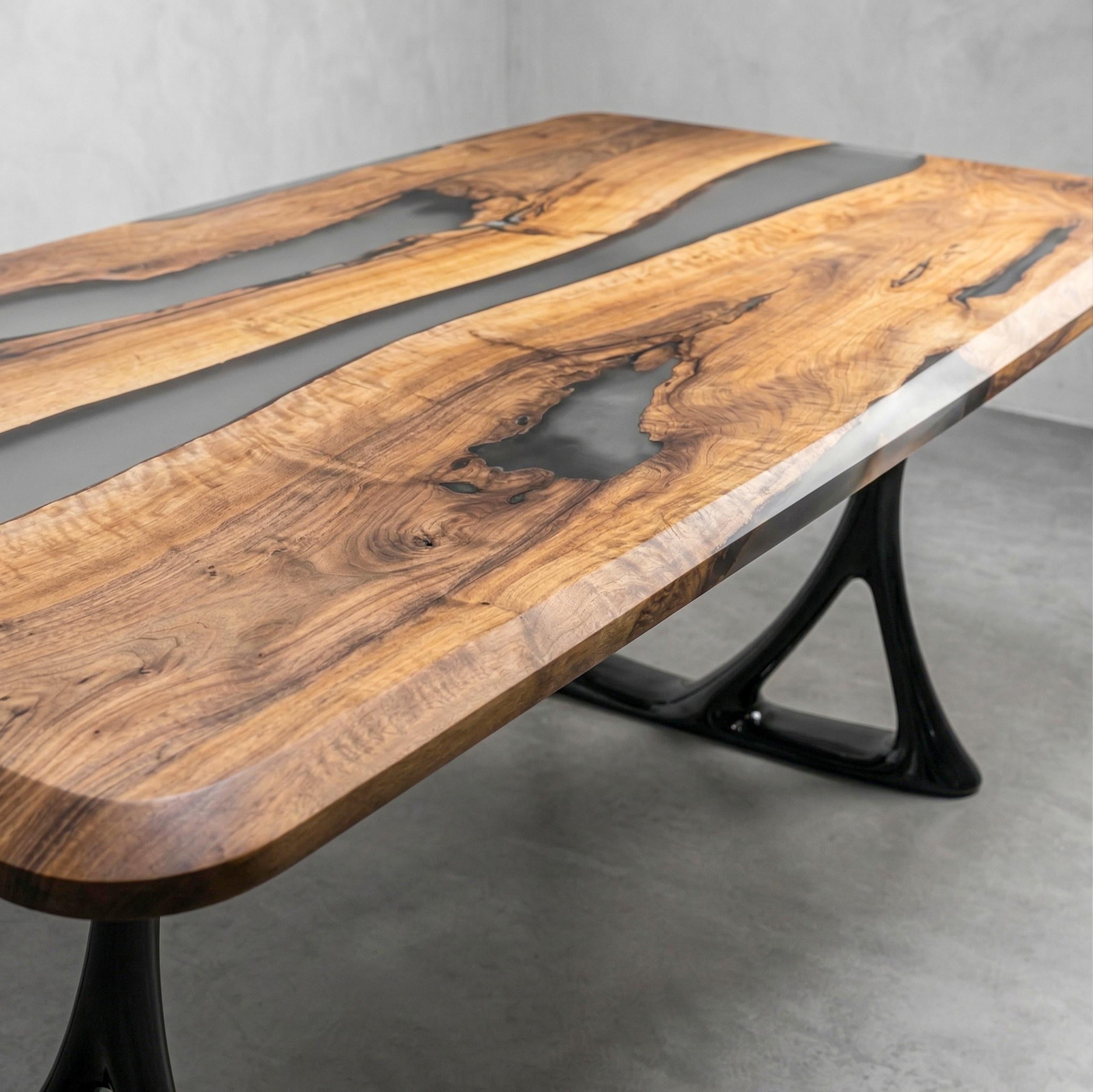 https://a.1stdibscdn.com/swiss-edge-walnut-smoky-epoxy-river-dining-table-custom-made-table-for-sale-picture-6/f_91932/f_495727721775639436670/walnut_wood_epoxy_table_2_master.jpg