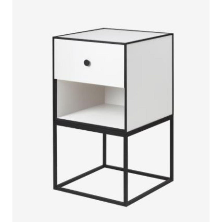 https://a.1stdibscdn.com/35-white-frame-sideboard-with-1-drawer-by-lassen-for-sale-picture-2/f_12192/f_329536021677250830320/whit_master.jpg?width=768