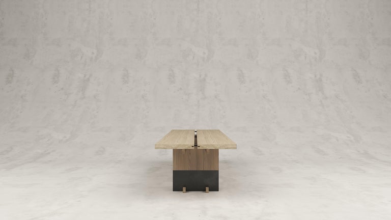https://a.1stdibscdn.com/rift-wood-and-metal-dining-table-by-andy-kerstens-for-sale-picture-4/f_12192/f_318189621671473553605/woodmetal_withfeet_3__master.jpg?width=768
