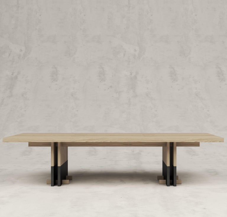 https://a.1stdibscdn.com/rift-wood-and-metal-dining-table-by-andy-kerstens-for-sale-picture-6/f_12192/f_318189621671473555249/woodmetal_withfeet_5__master.jpg?width=768