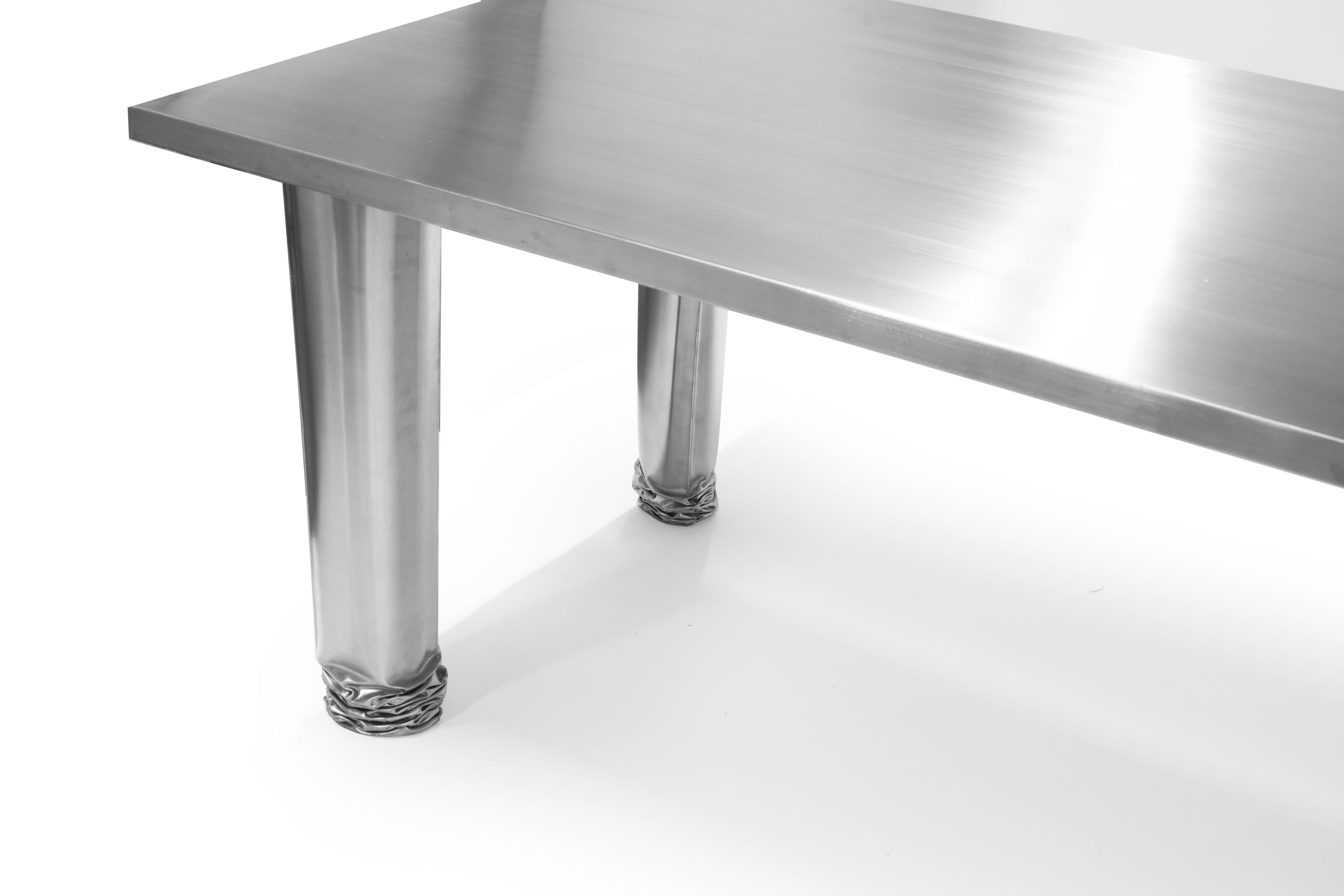 https://a.1stdibscdn.com/contemporary-dining-table-crash-by-zieta-stainless-steel-for-sale-picture-8/f_31233/f_327074821676045301216/zieta_studio_crash_table2_master_master.jpeg
